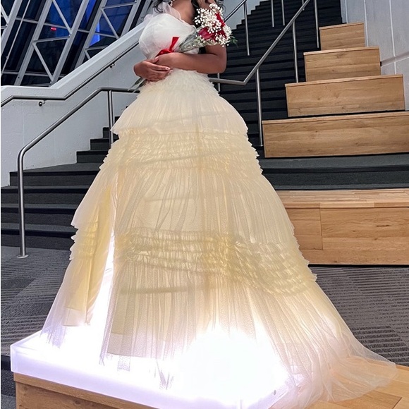 A strapless princess dress with a slit. - Picture 1 of 3